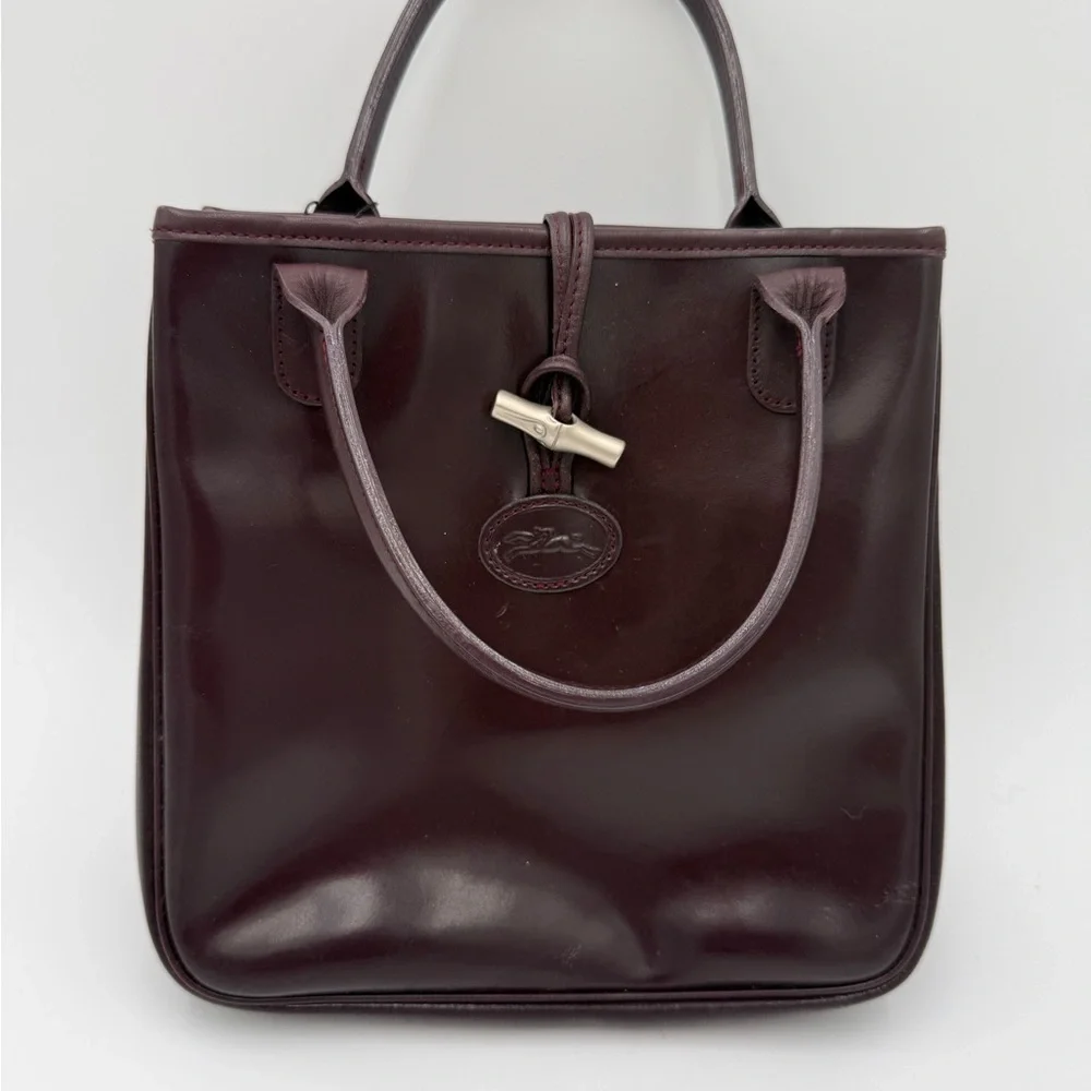 Elegant Longchamp burgundy Leather Handbag